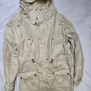 Tan Bench rain parka jacket with adjustable waist and hood